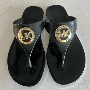 Michael Kors Lillie Black jelly thongs.